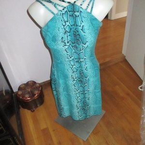 new without tags aqua and black snakeskin med but more like a small kimi  Kal